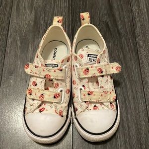 In great condition Converse All Star ladybug print toddler girl shoe.